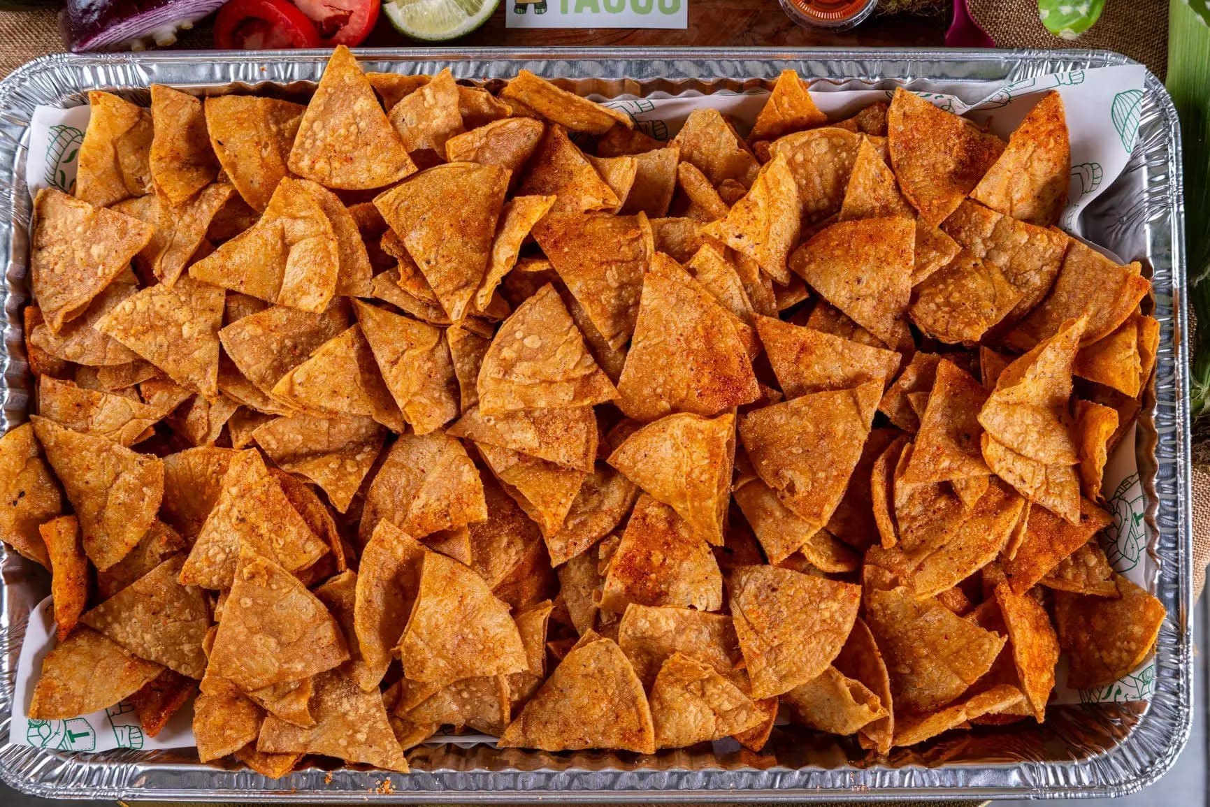 Taylor's Tacos Chicago large catering tray of seasoned tortilla chips for group orders and corporate catering events